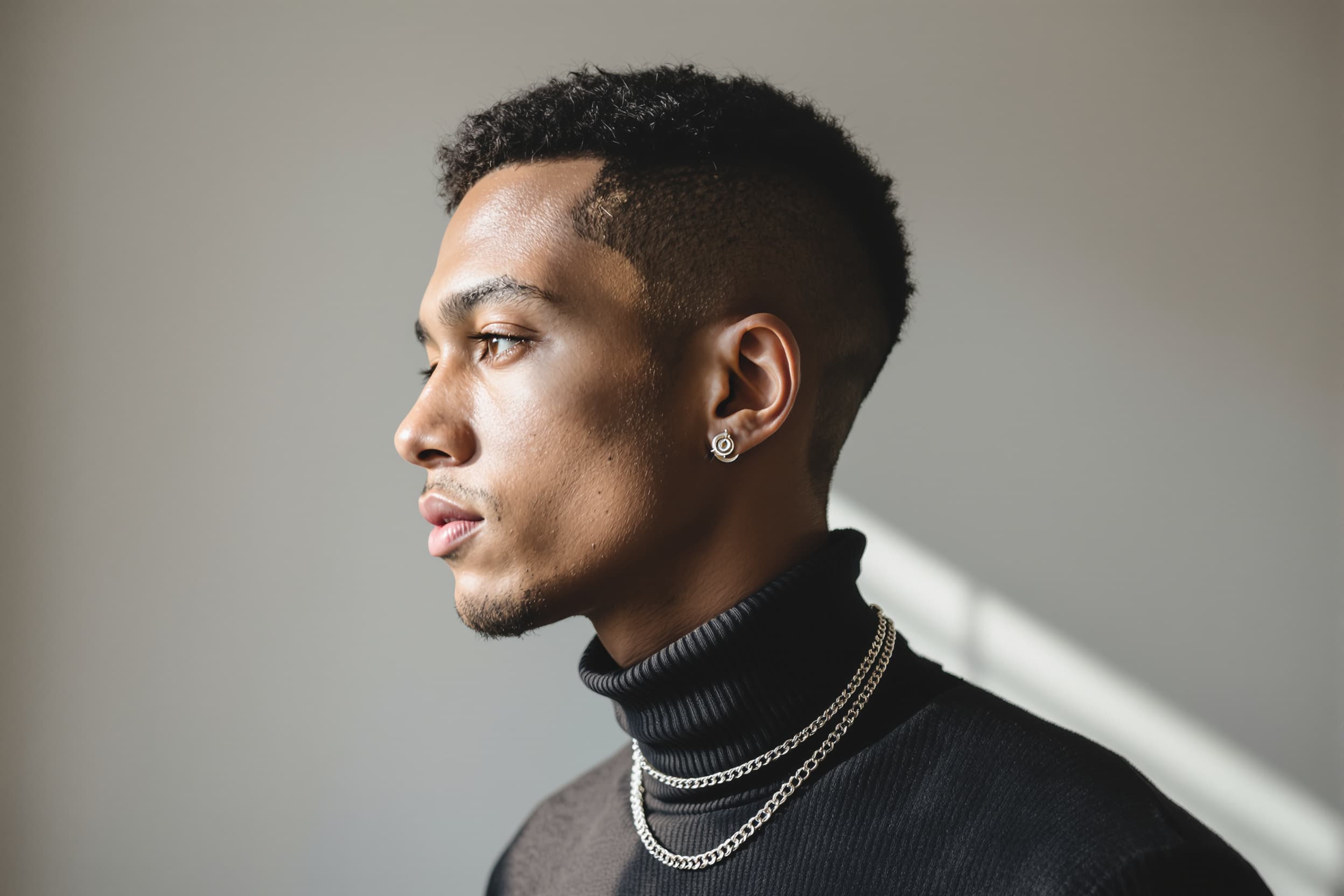 Contemplative Young Man in Turtleneck