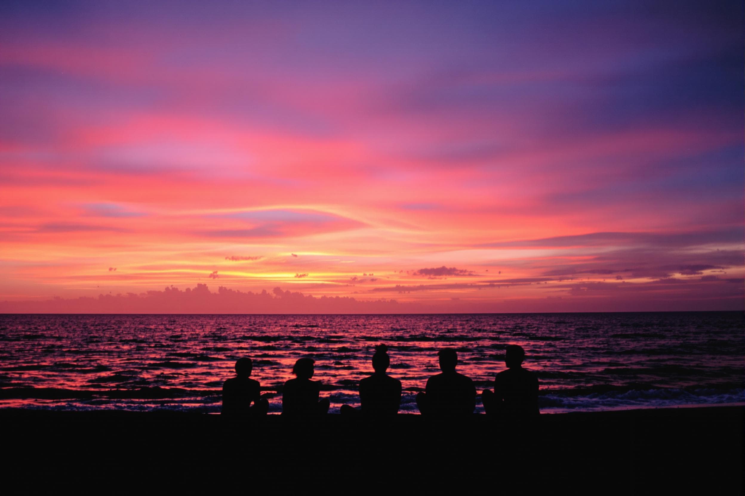 Serene Sunset Silhouettes on the Beach