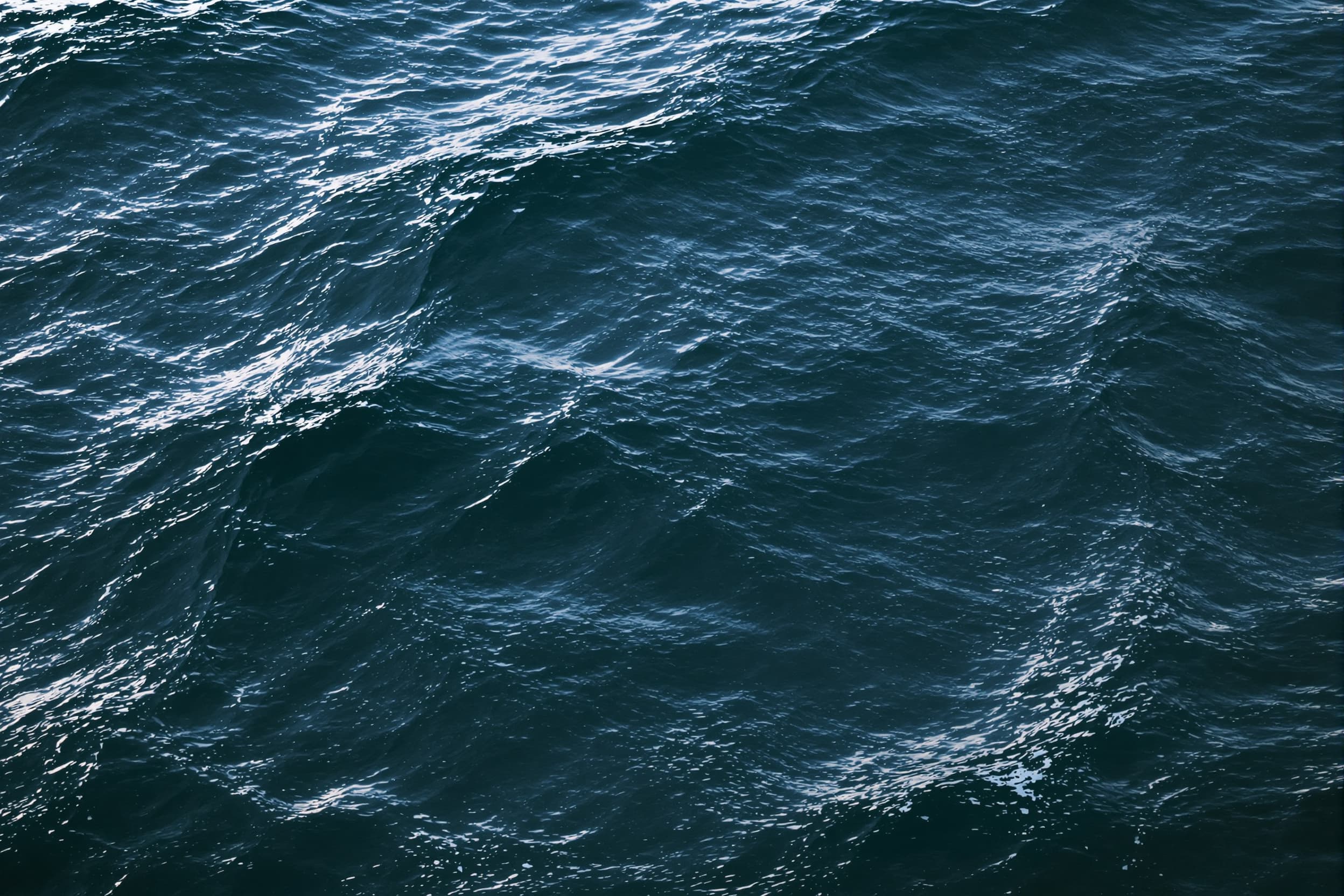 Serene Ocean Waves in Moody Blue
