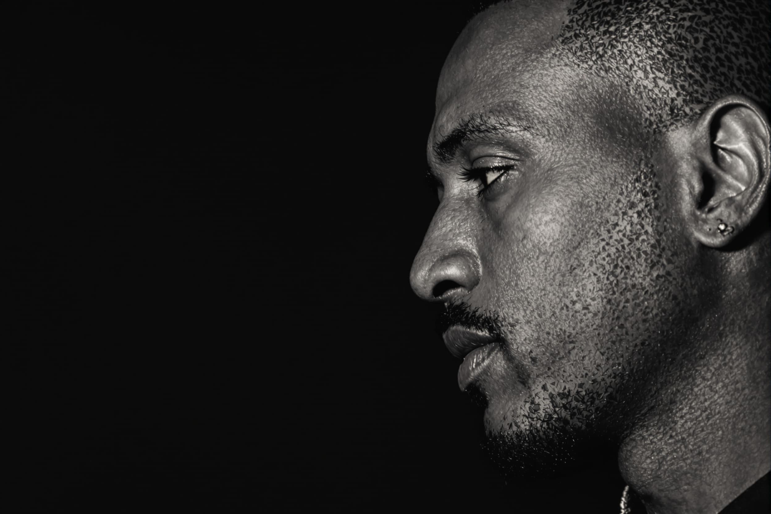 Introspective Man in Monochrome Light