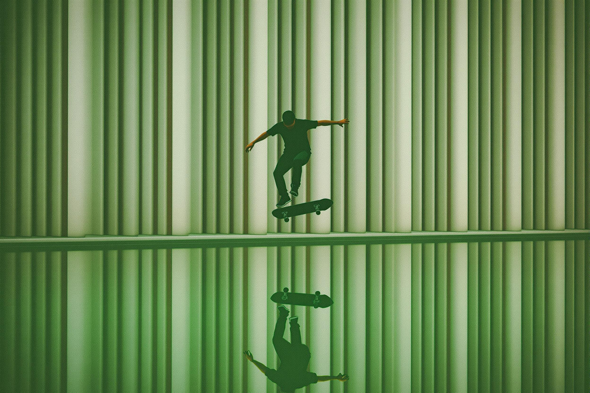 Skateboarder Soars Above Reflections
