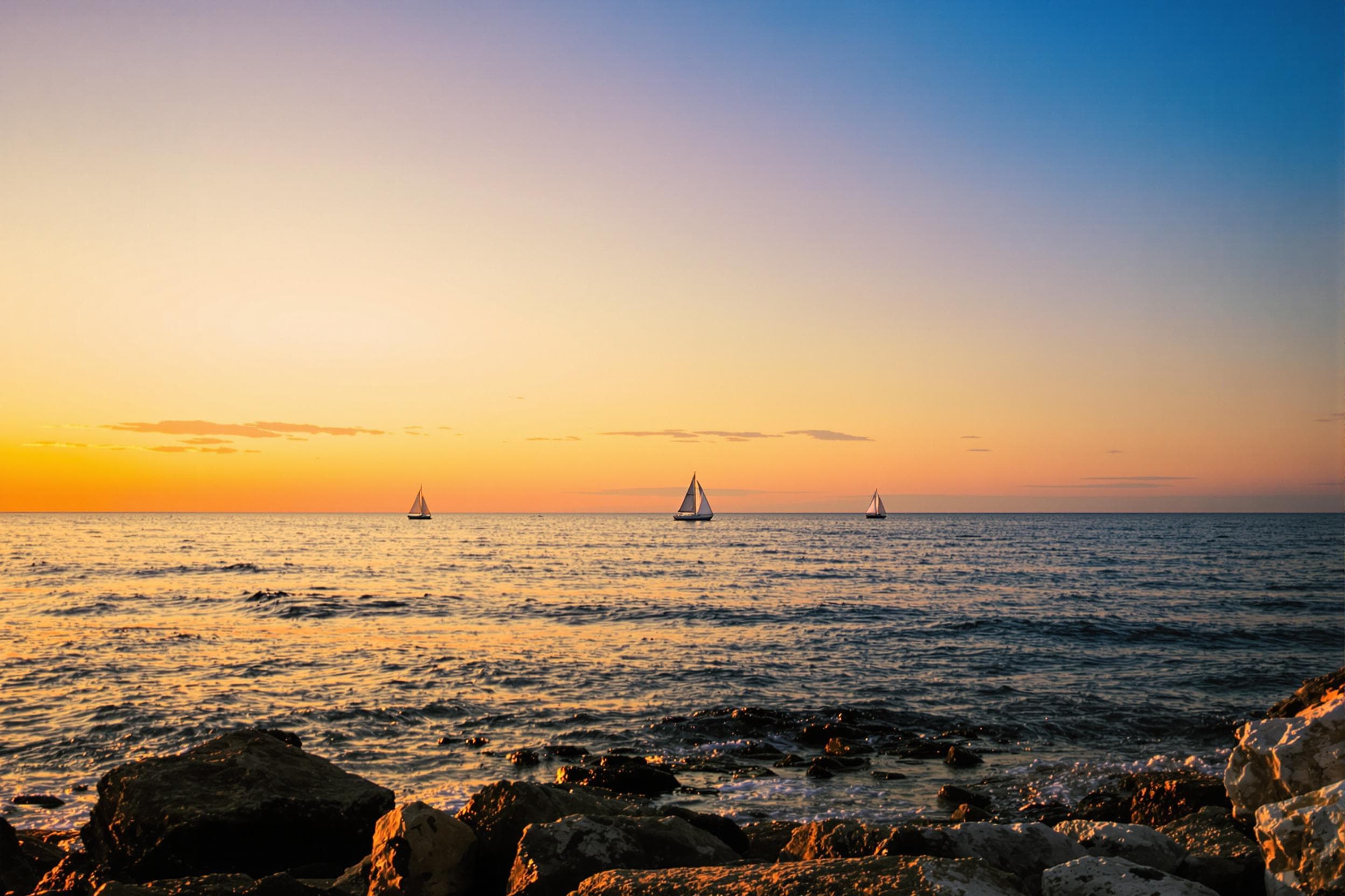 Tranquil Sunset Seascape with Sailboats