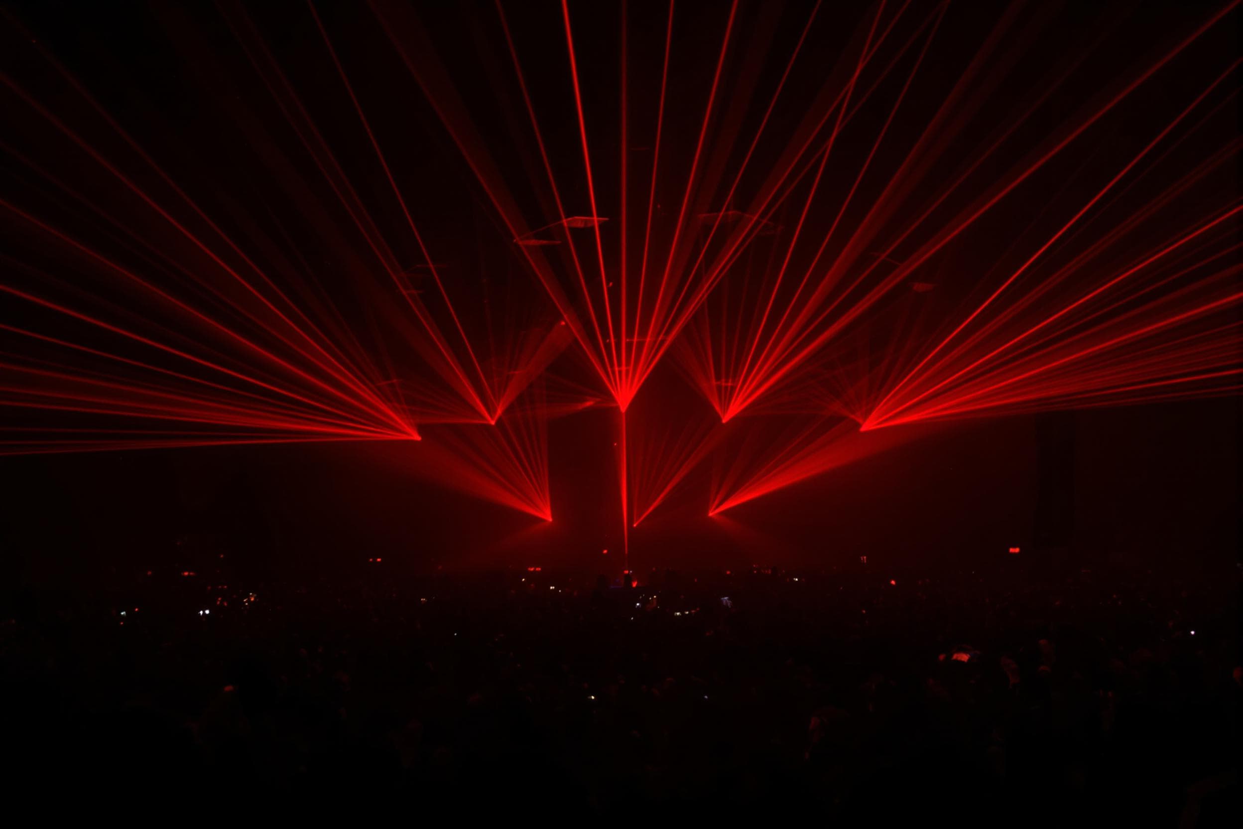 Energizing Concert with Radiant Red Lasers