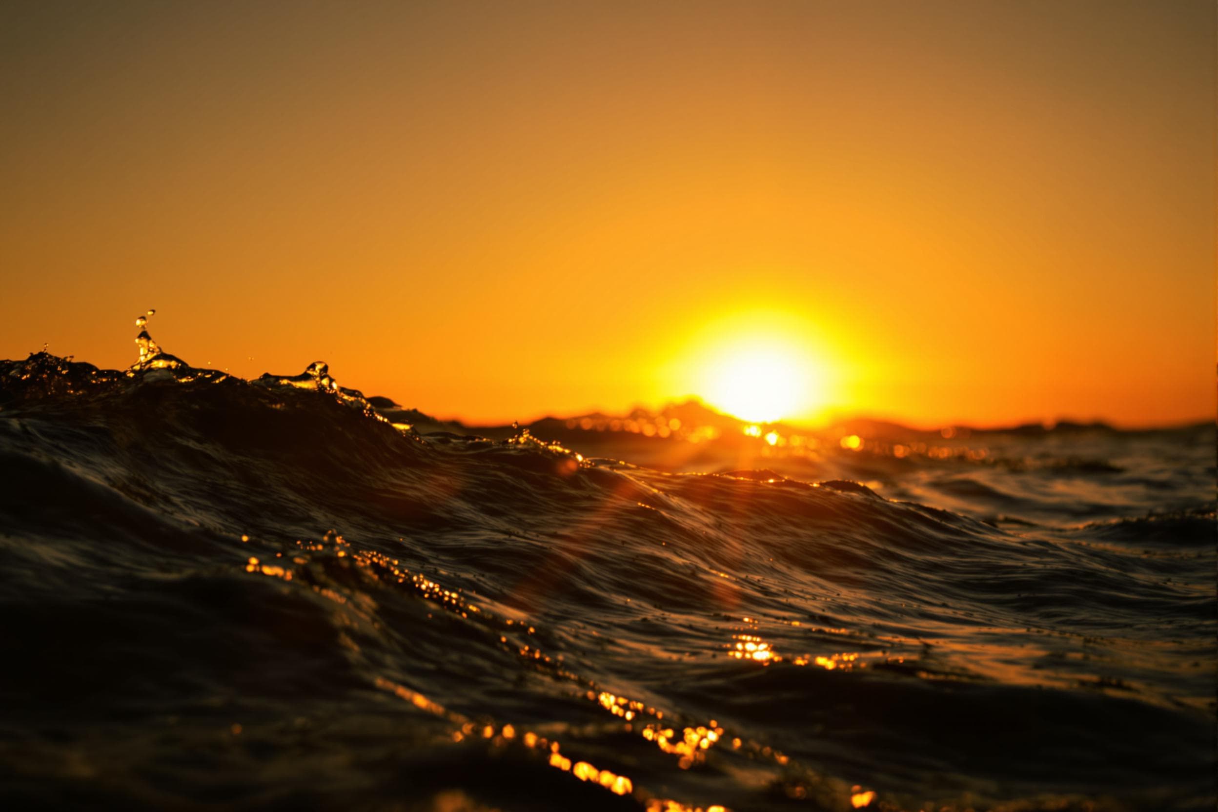 Golden Sunset Over Ocean Waves