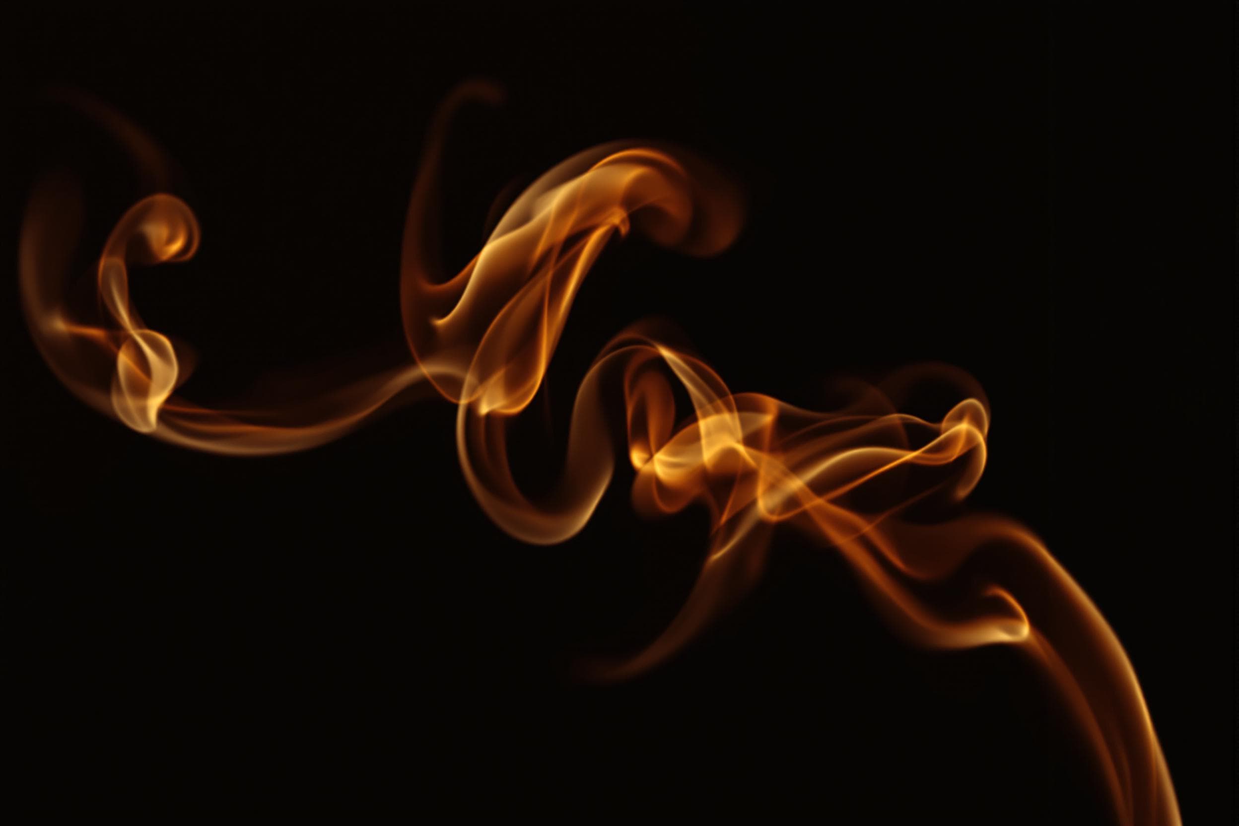 Ethereal Smoke Swirls in Warm Hues