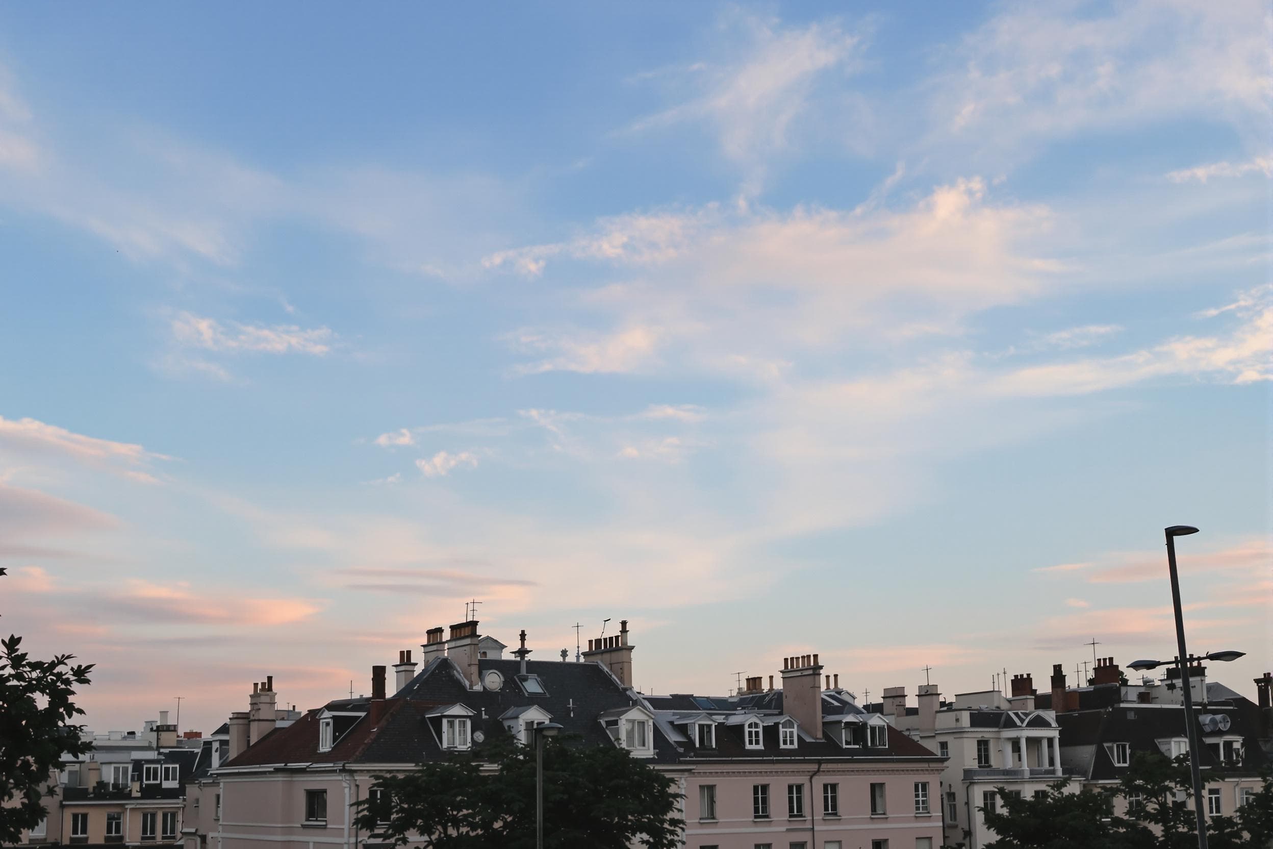 Serene Urban Rooftops Under a Clear Sky