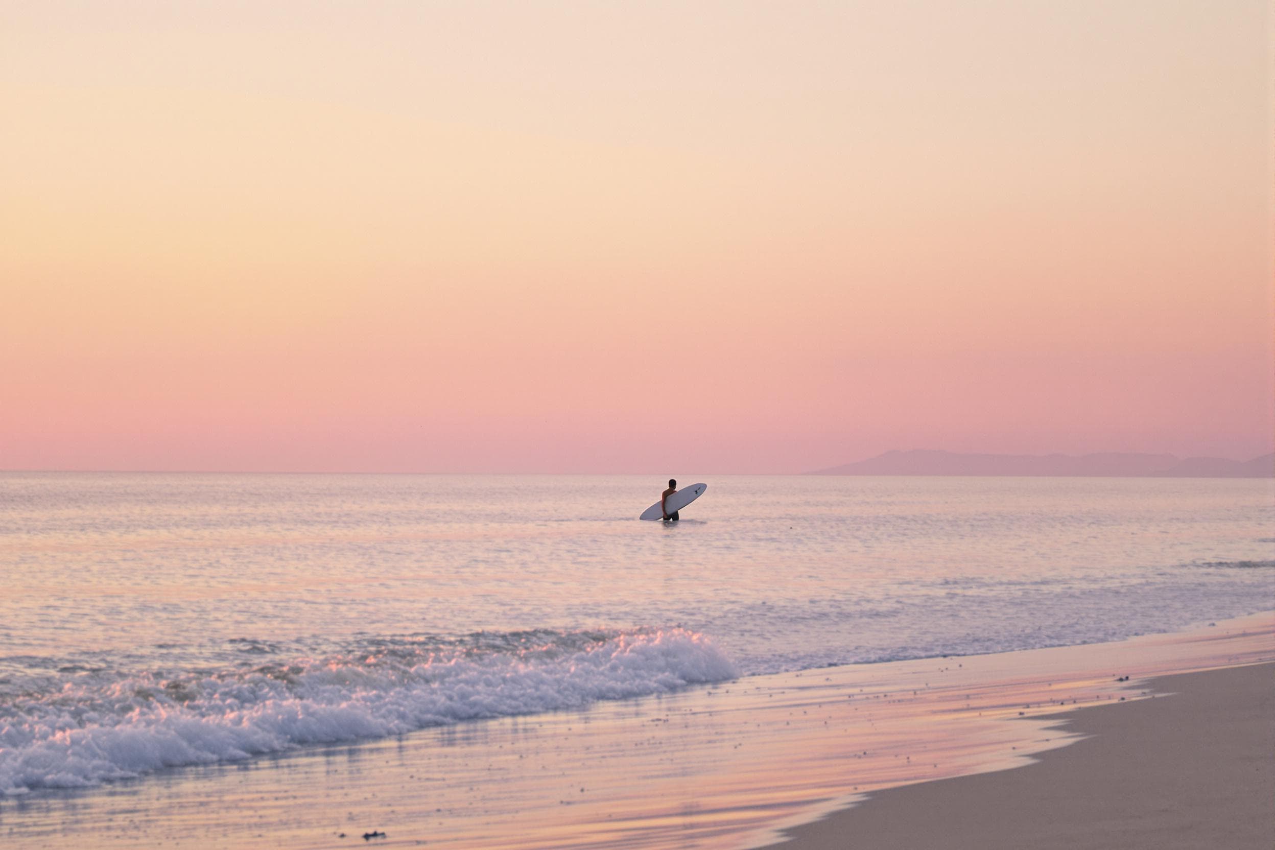 Serene Sunset Surfing Solitude