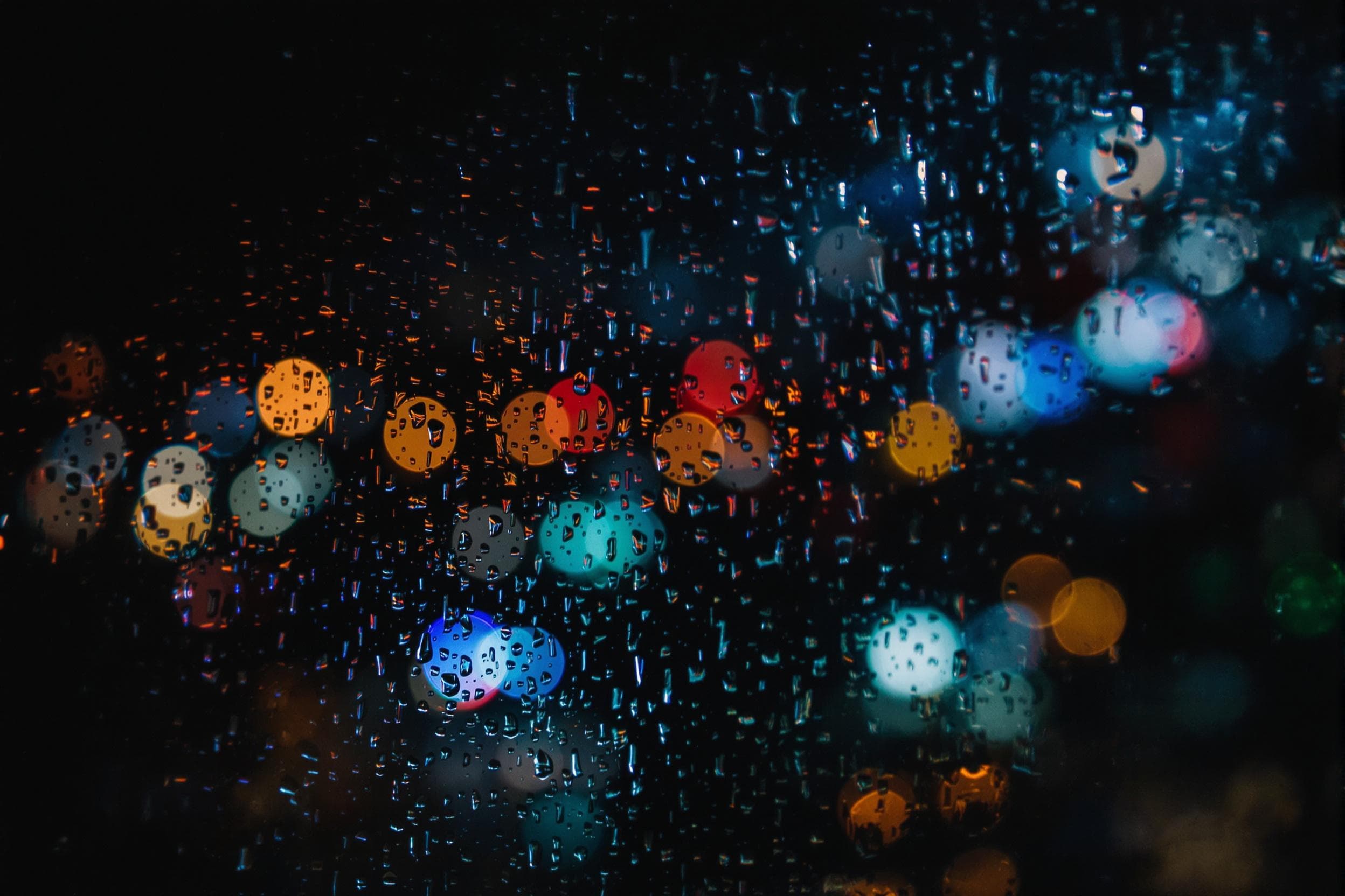 Moody City Lights Through Rain