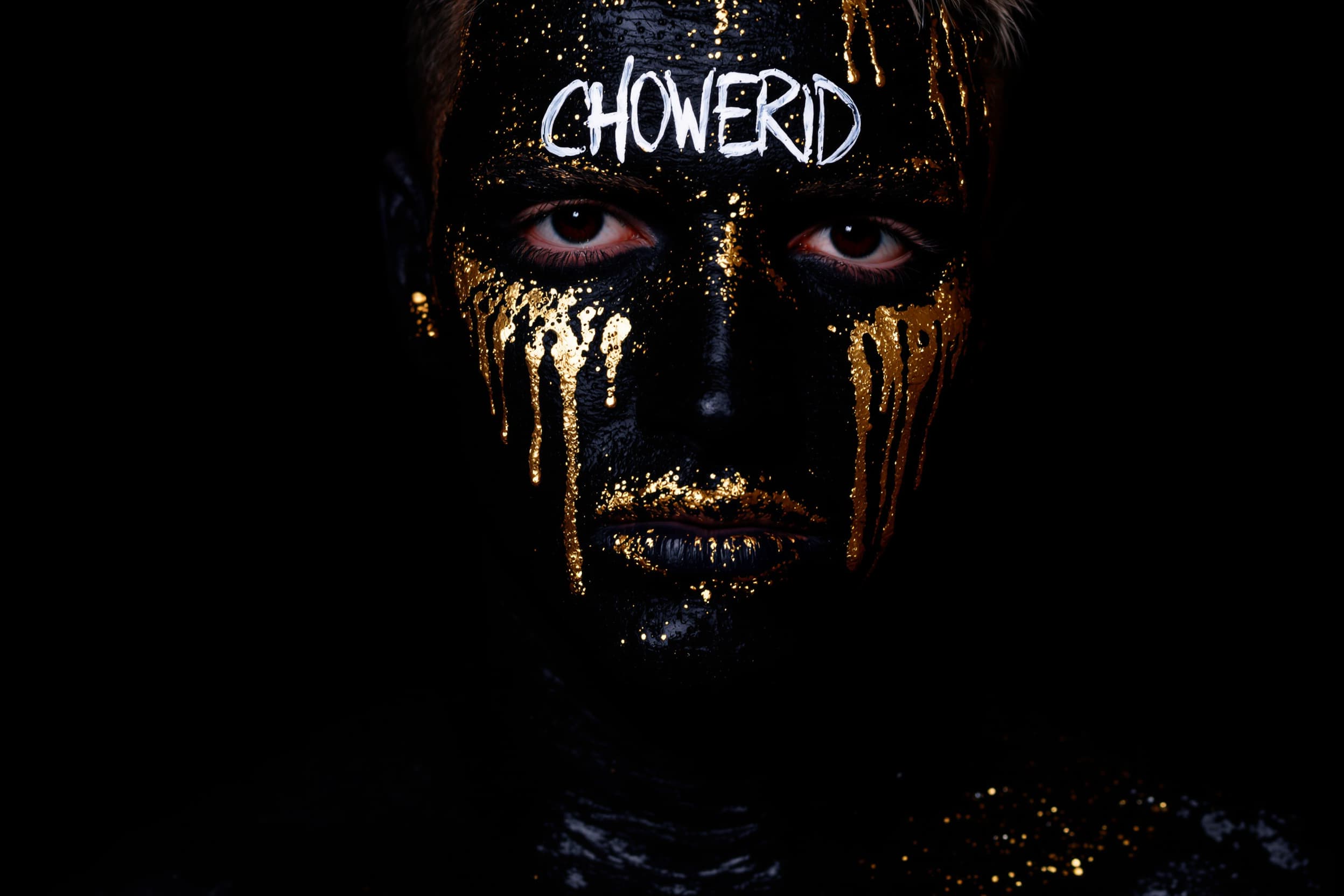 Bold Artistic Makeup in Black and Gold