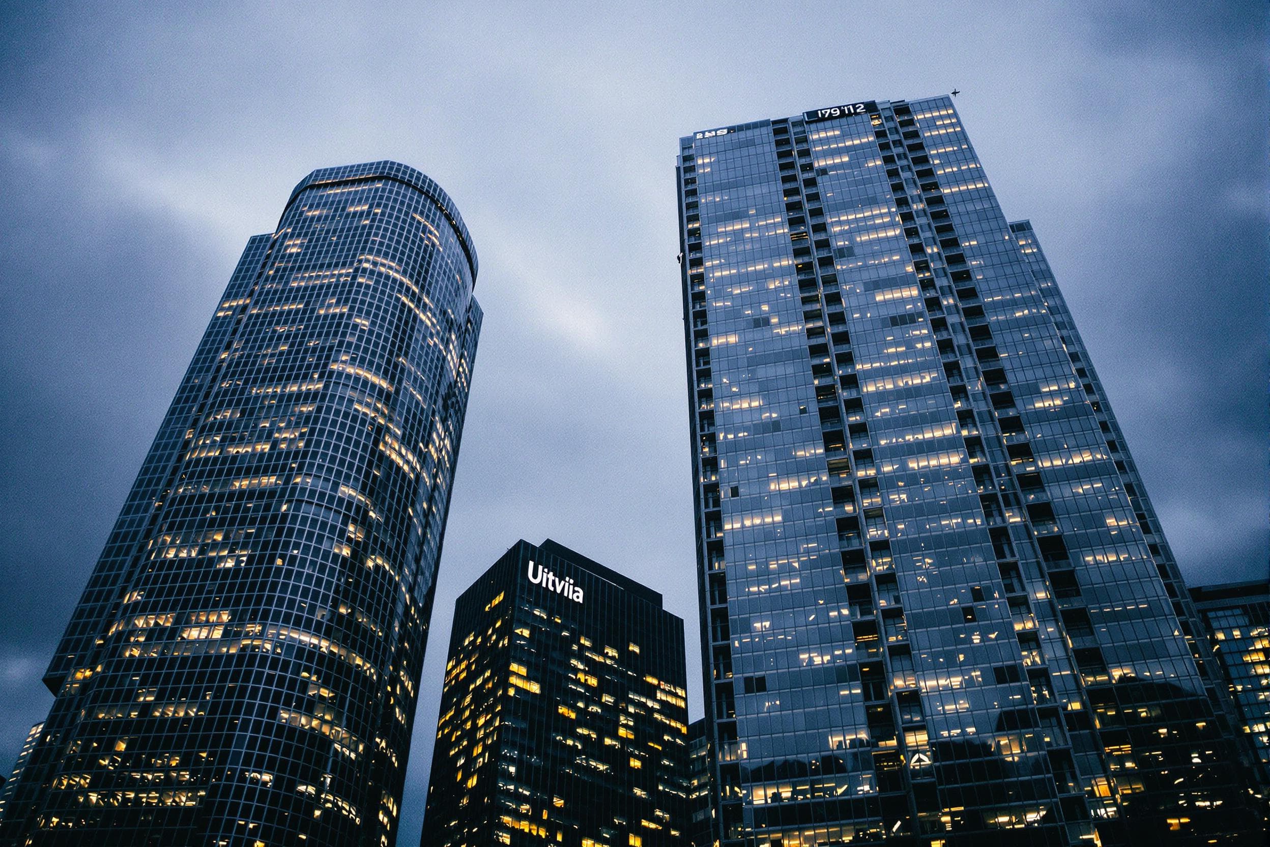 Dusk Cityscape: Illuminated Skyscrapers