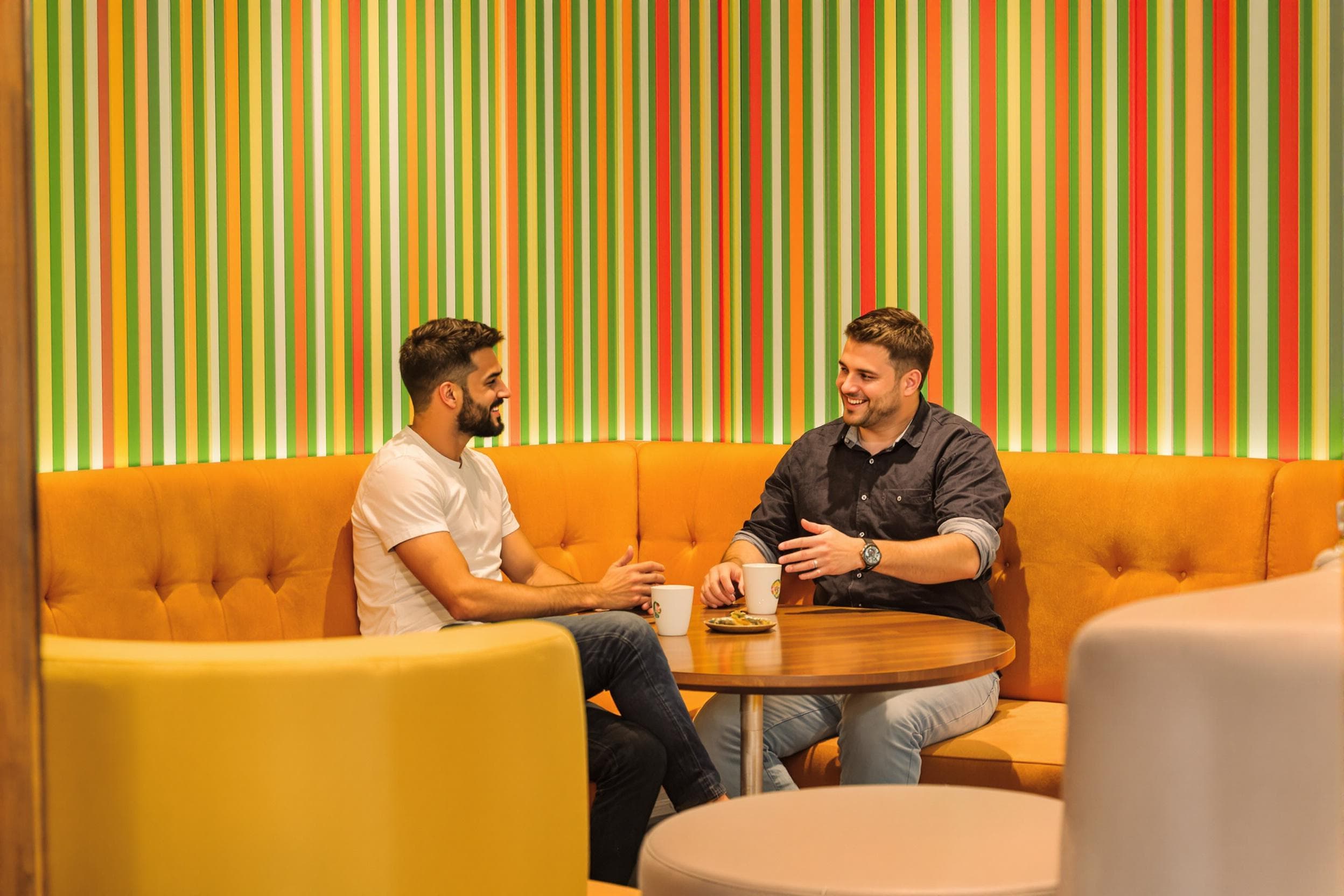Casual Conversation in a Trendy Workspace