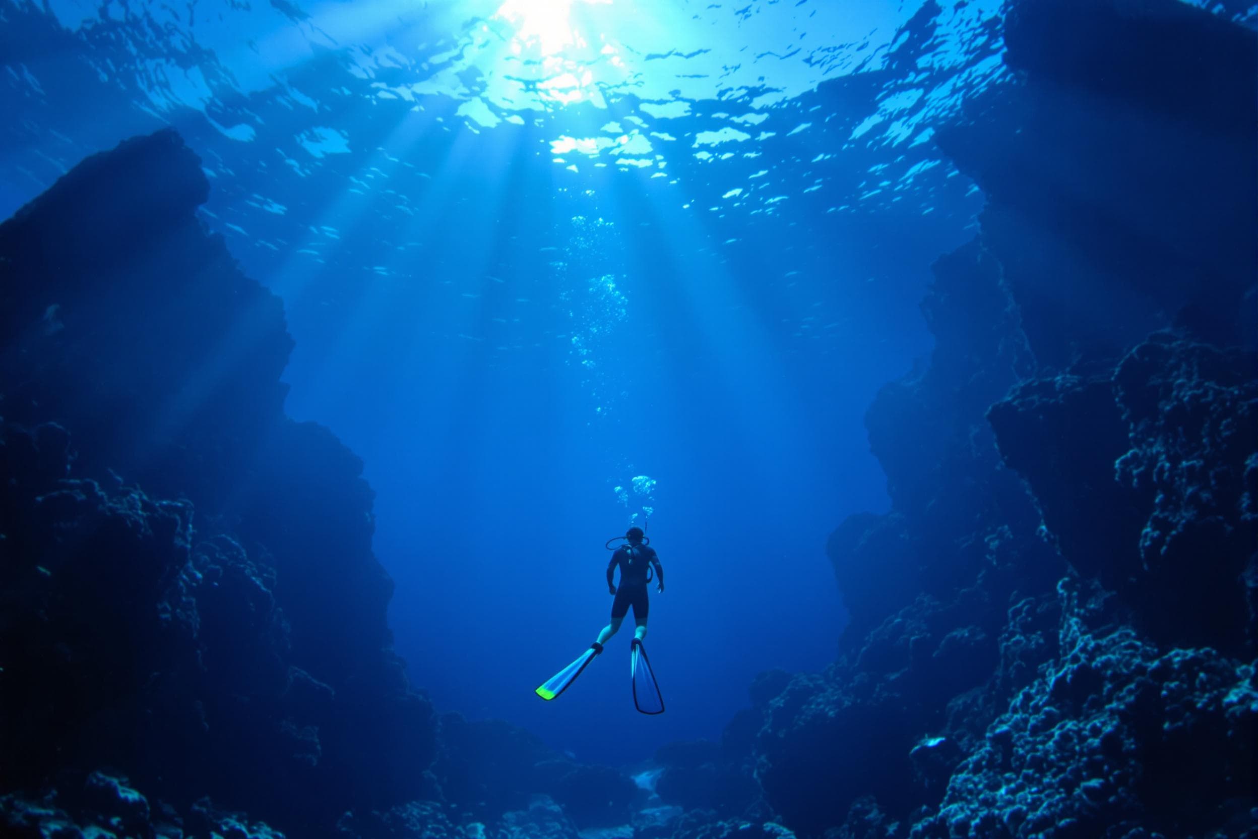 Serene Freediver in Ethereal Blue Waters