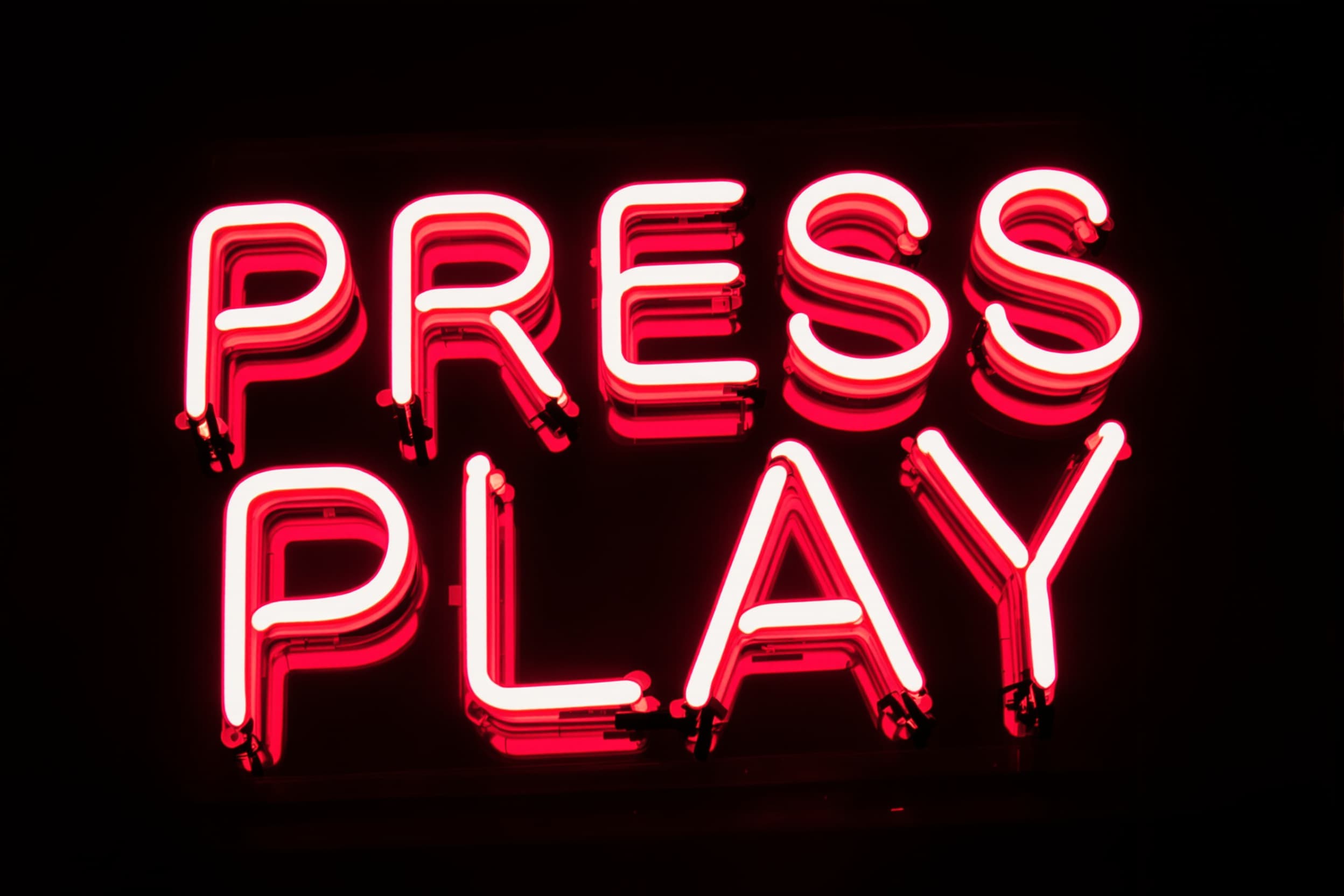 Vibrant Neon 'PRESS PLAY' Sign