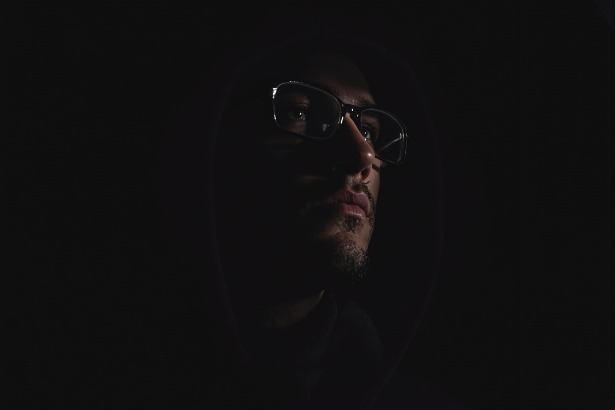 Mysterious Man in Chiaroscuro Lighting