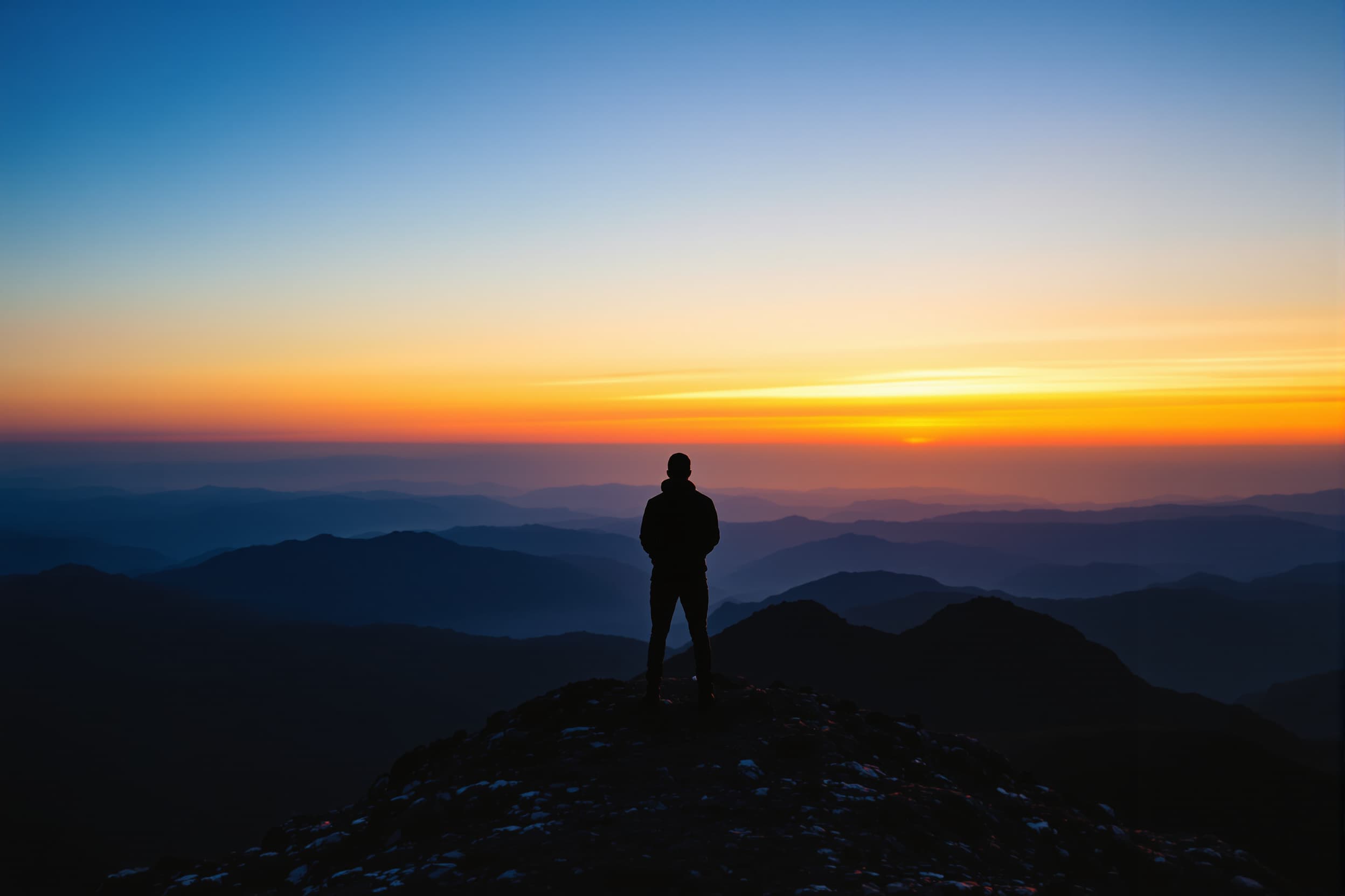 Solitary Adventurer at Sunset Peak