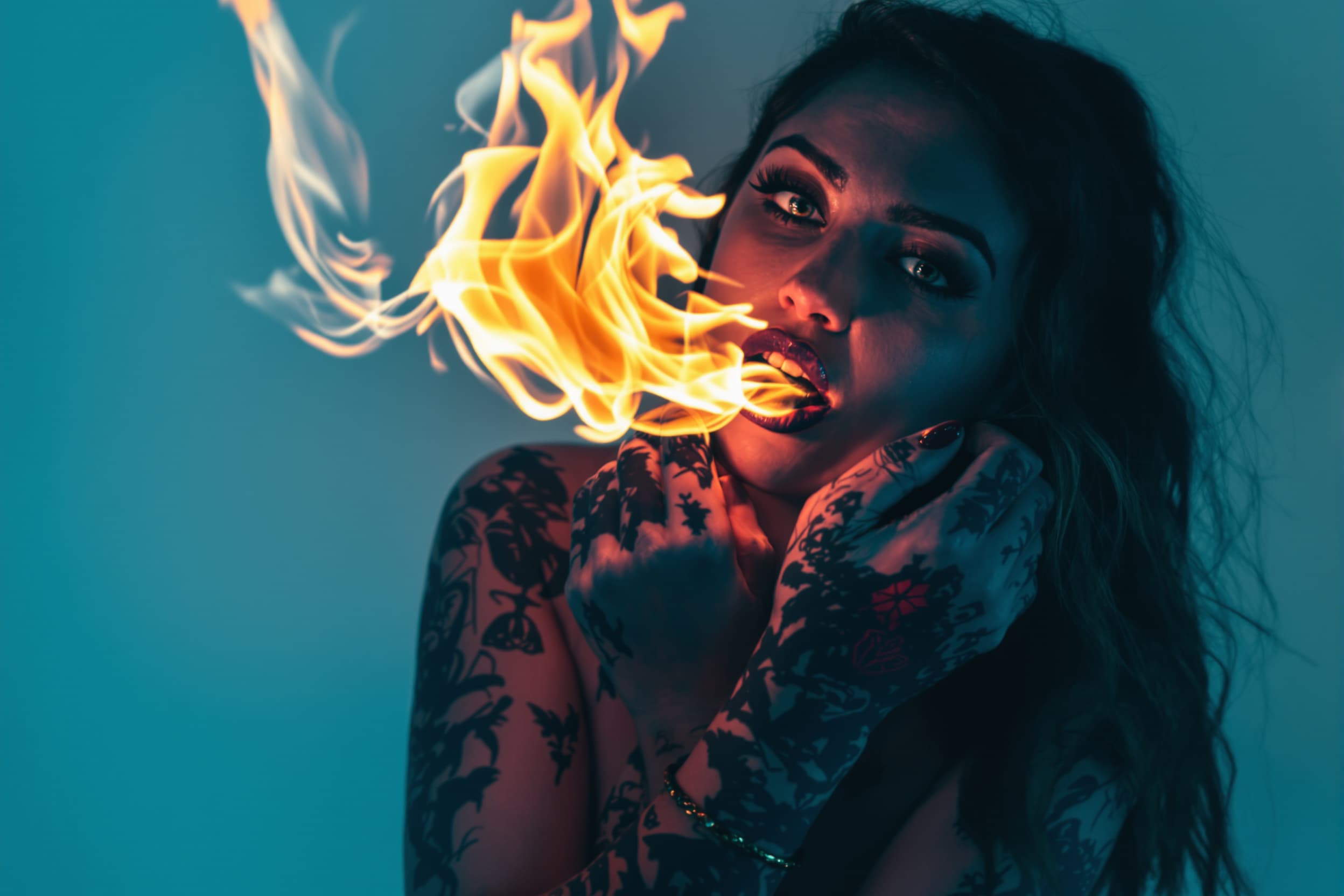 Intense Flame-Kissed Tattooed Model