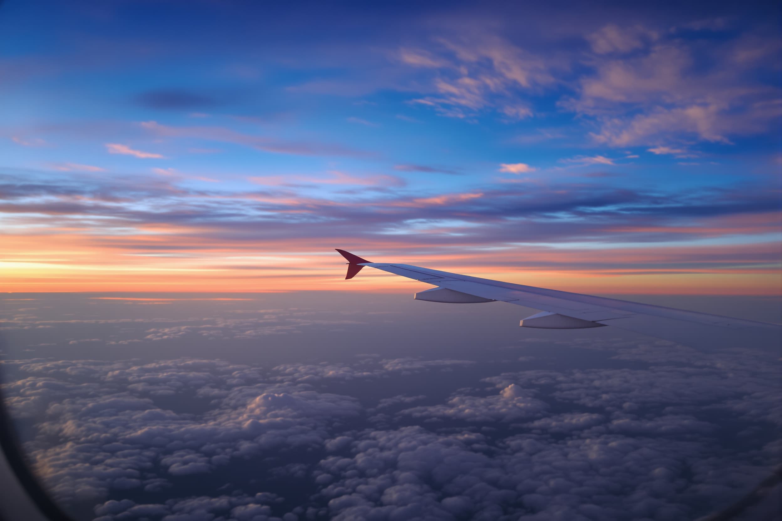 Serene Airplane Wing at Sunset